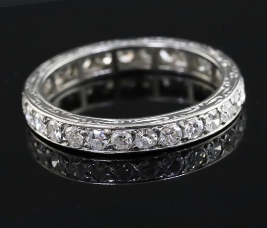 A platinum? and diamond set full eternity ring, size K.